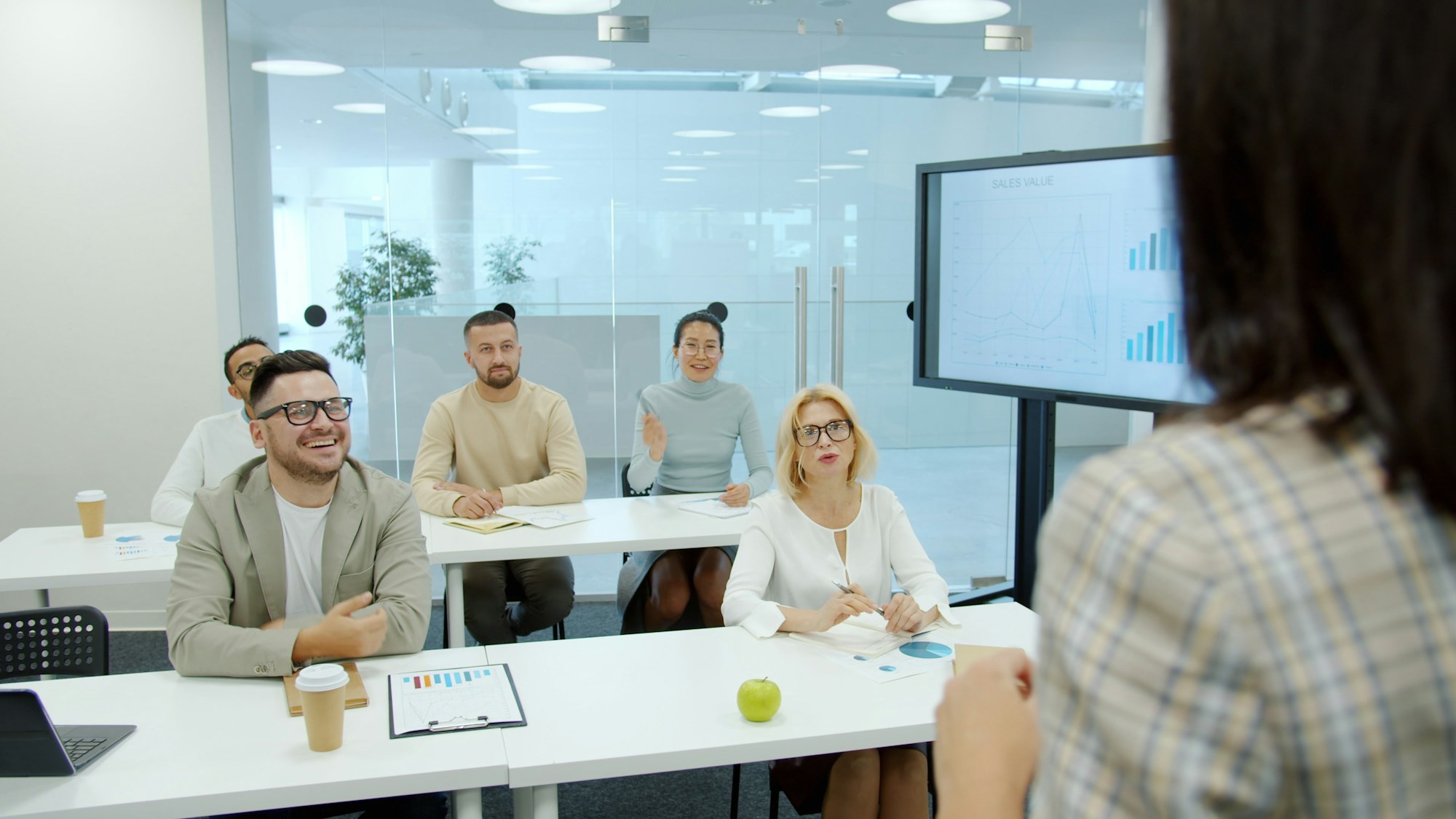 A diverse group participating in professional staff training